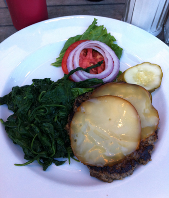 Bun-less Turkey Burger with Smoked Gouda and a  side of sauteed spinach