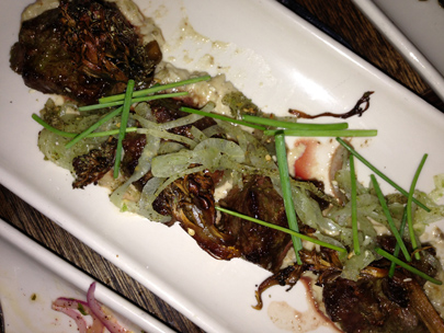 Hanger steak with with babaganoush, mushrooms and spicy schoug