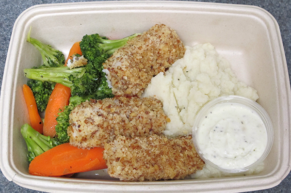 Almond crusted fish sticks with cauliflower mash, broccoli and carrots 